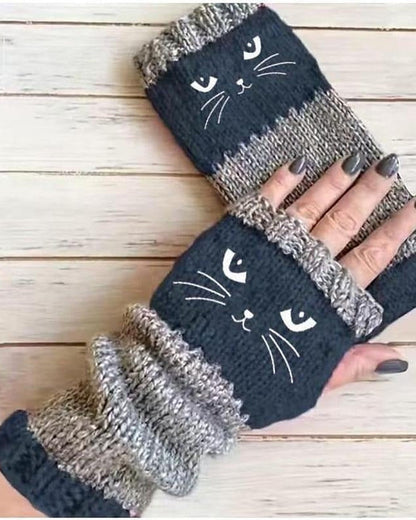 Navy knit fingerless gloves with embroidered cat face