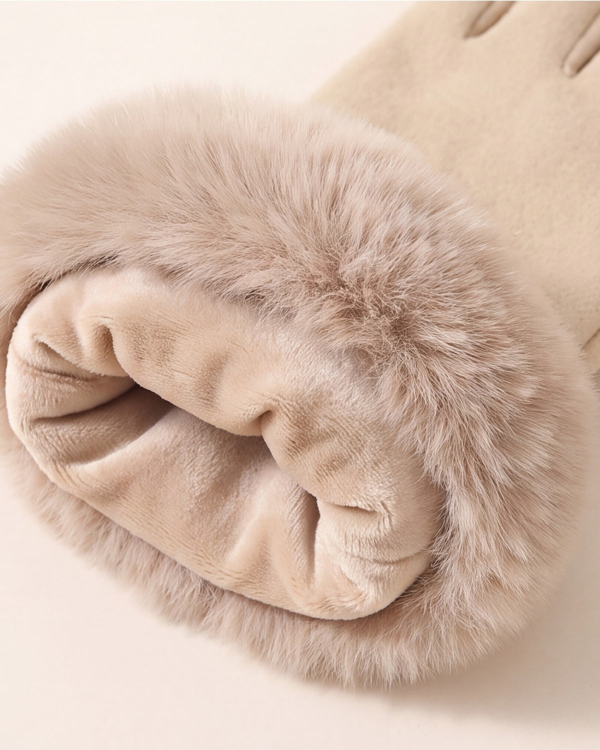 Close-up of the plush velvet lining and fluffy faux fur cuff