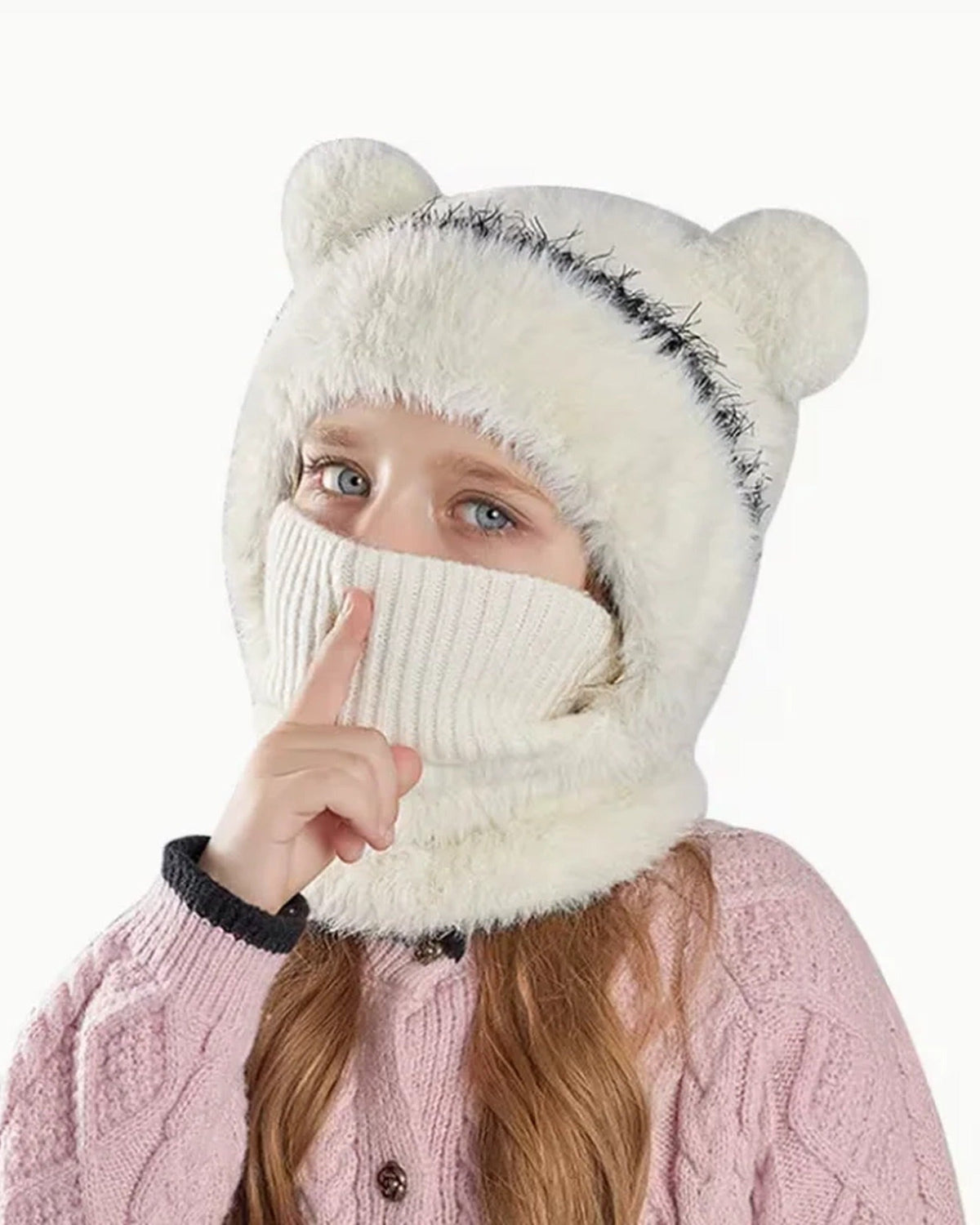 Girl wearing a white teddy bear hood with the knit face cover pulled up