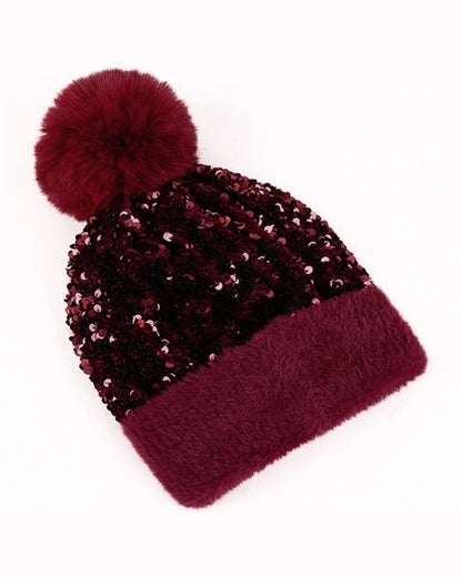 Wine sequin pom pom beanie with fuzzy cuff and faux fur pom pom